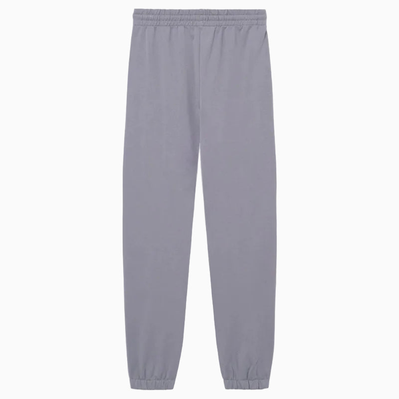 Hellgraue Jogginghose mit elastischem Bund und elastischen Bündchen an den Knöcheln, flach auf weißem Grund.