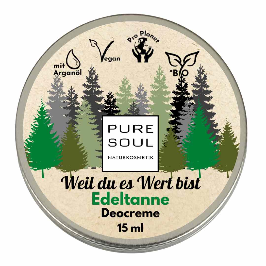 Runde Dose Pure Soul Naturkosmetik Edeltanne Deocreme, 15 ml, mit einer Waldillustration und deutschem Text. Die Symbole weisen darauf hin, dass sie vegan, arganölhaltig, biologisch und umweltfreundlich ist.