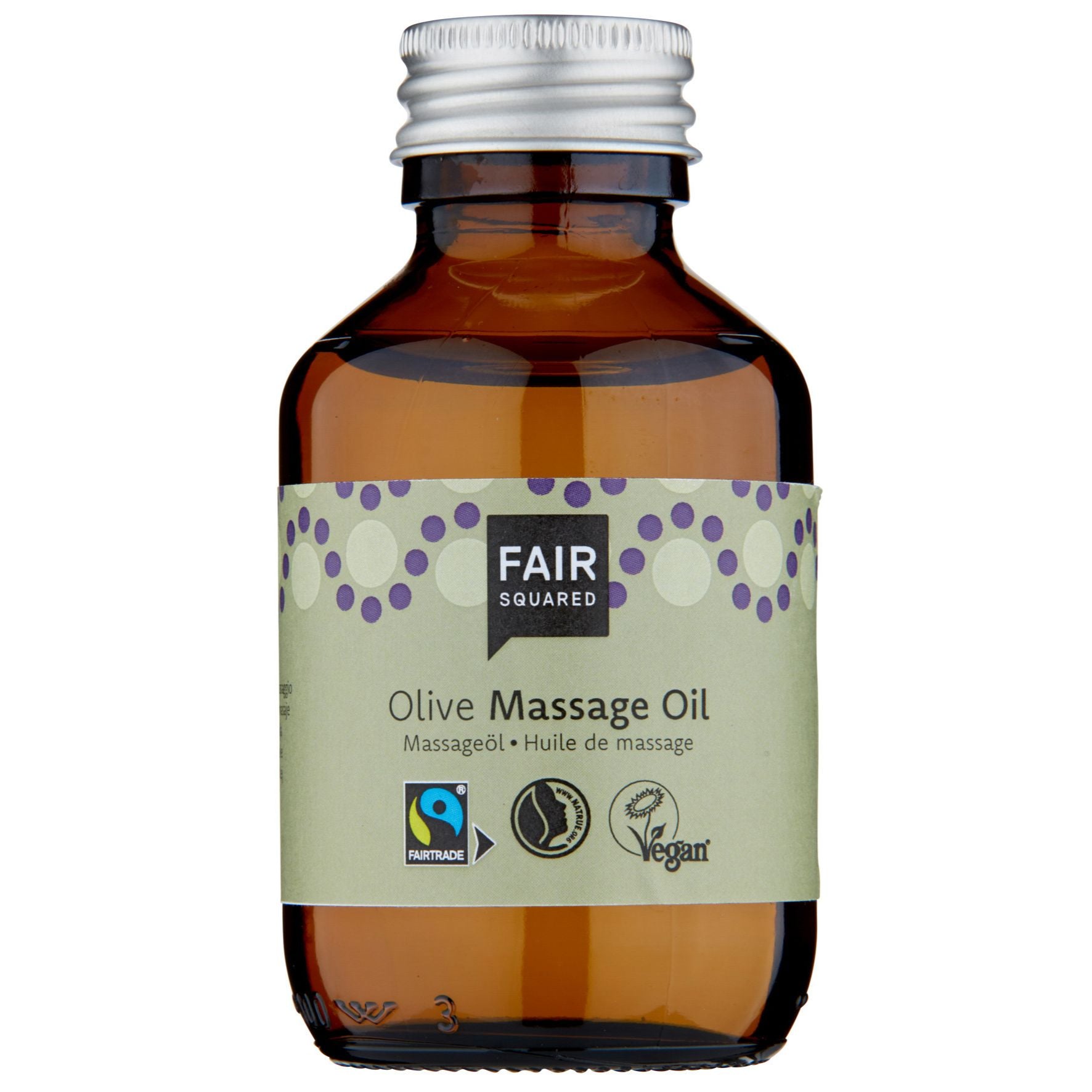 Eine braune Glasflasche mit FAIR Squared Oliven-Massageöl mit einem silbernen Verschluss und einem grünen Etikett mit Fairtrade- und Vegan-Logos.
