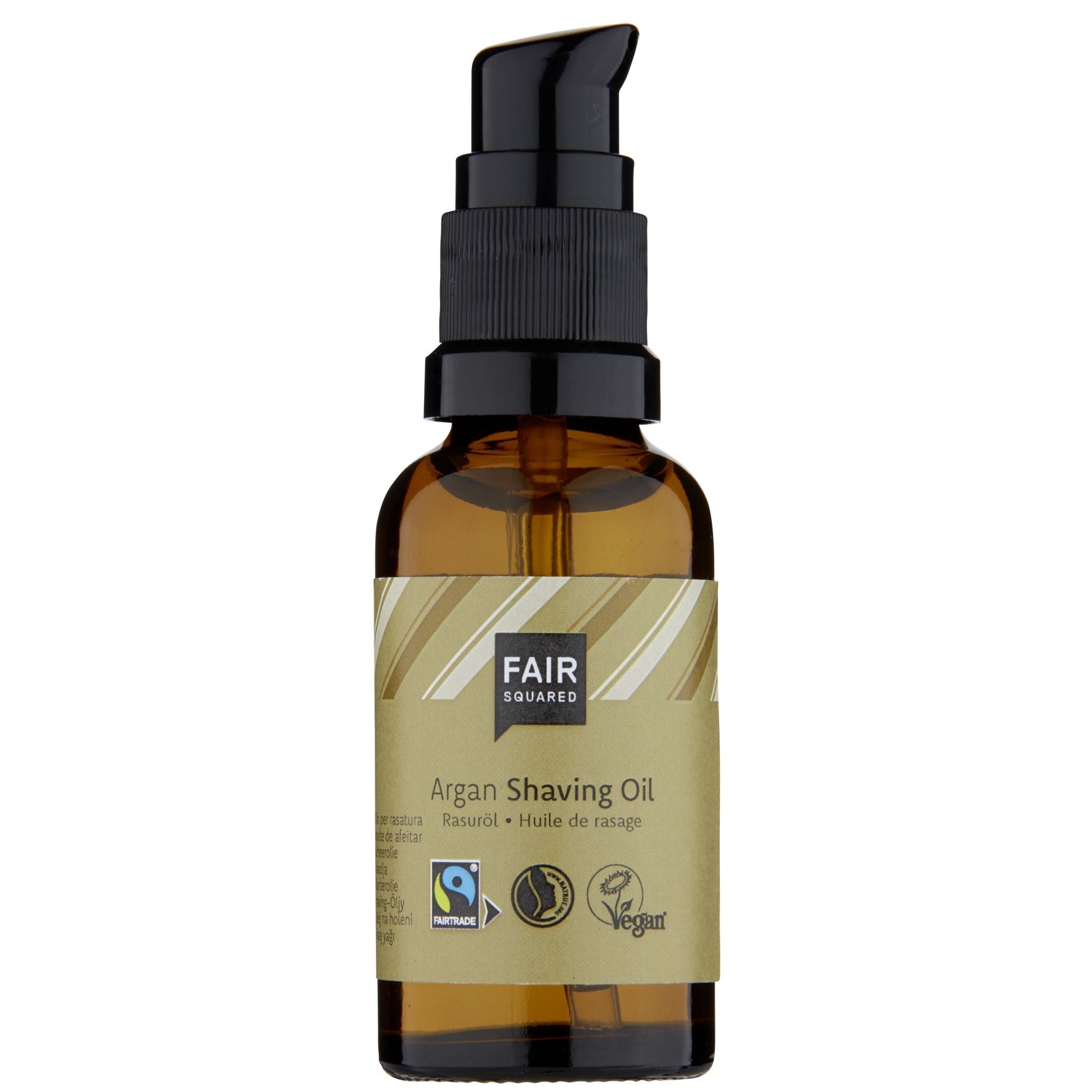 Eine braune Pumpflasche mit Fair Squared Argan Rasieröl und einem goldenen Etikett mit den Logos der Fairtrade-, NATRUE- und Vegan-Zertifizierung.